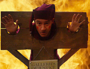 david ford as medieval jester in stocks